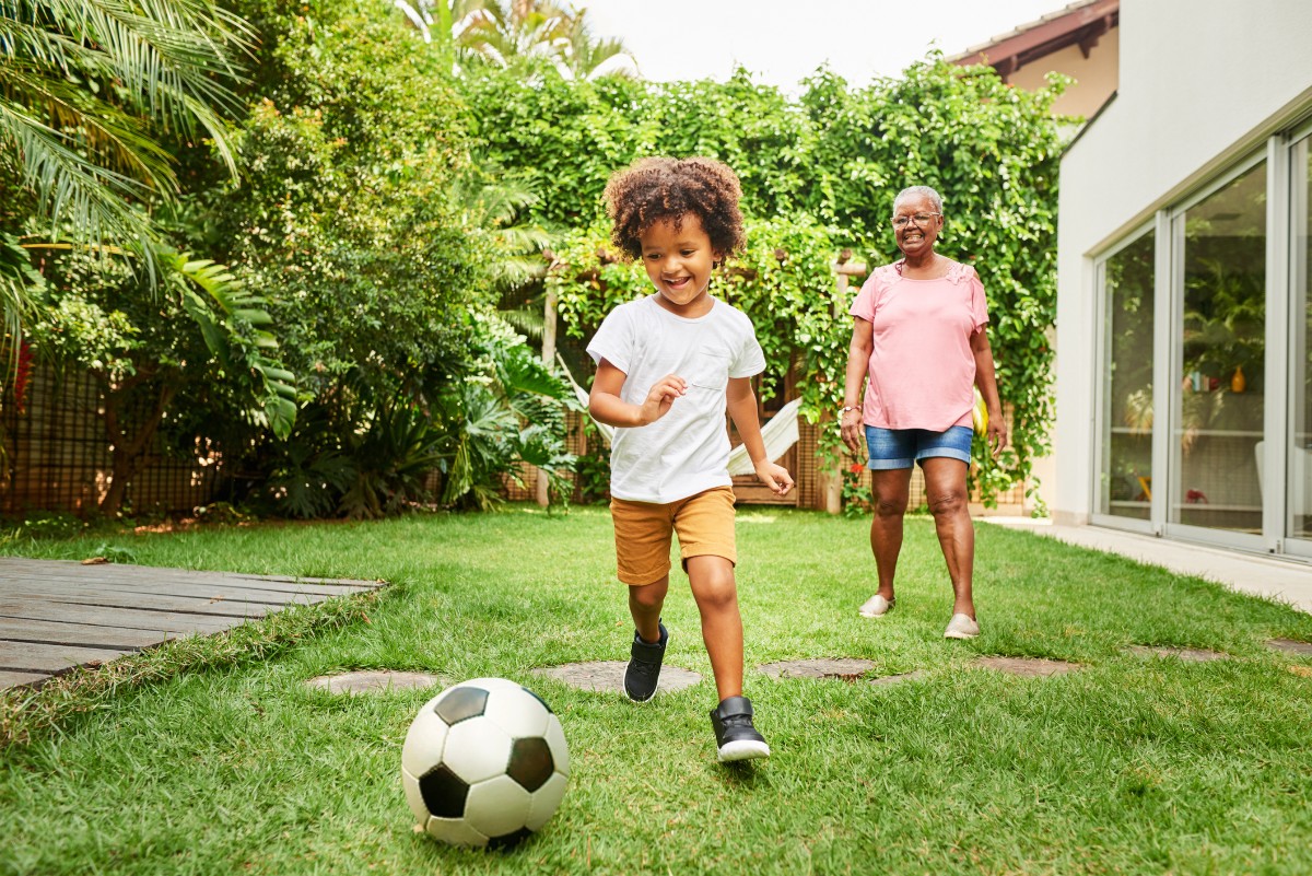 boy play soccer outdoor