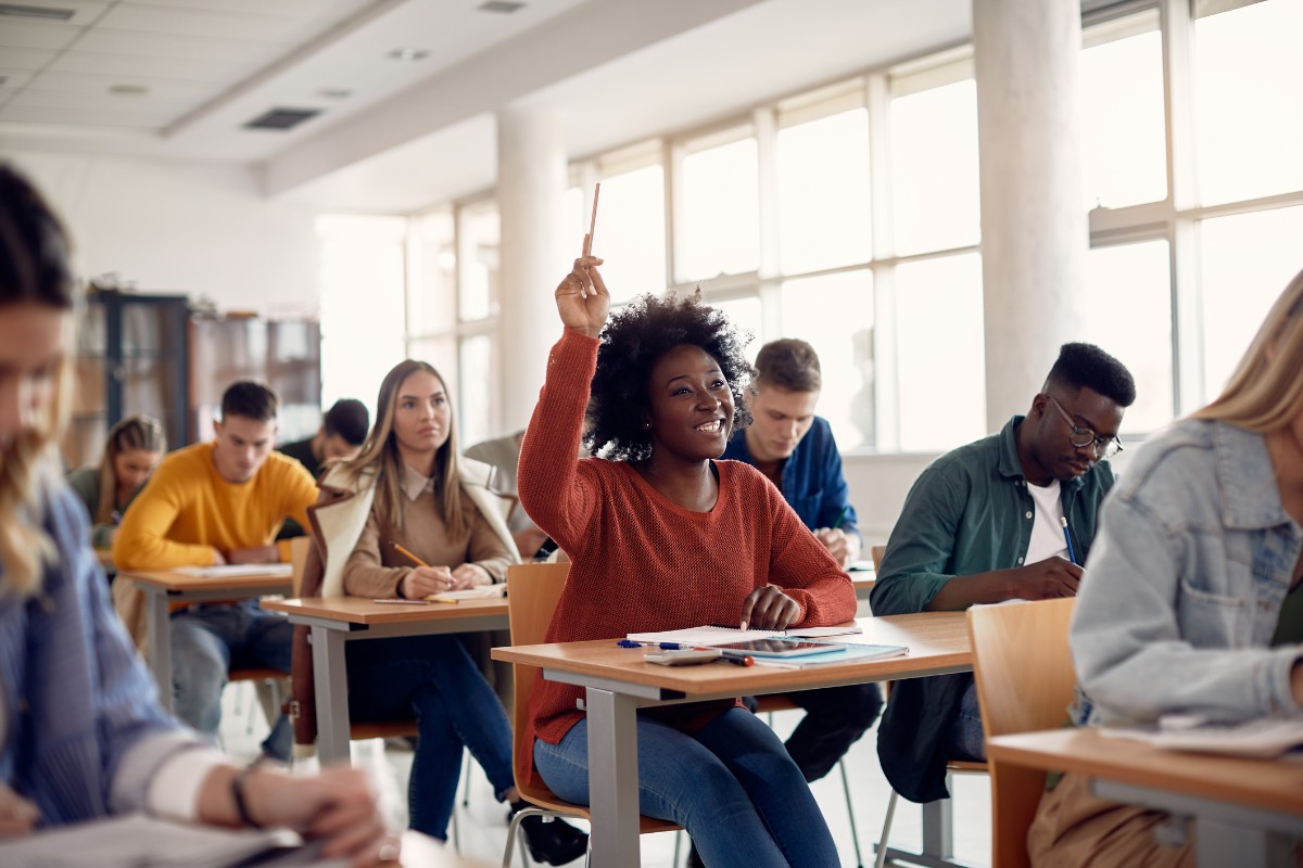 student raising hand